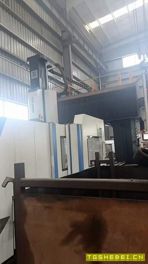 湖南工厂刚刚买下国盛4027龙门一台,工作台2米4米,门.
